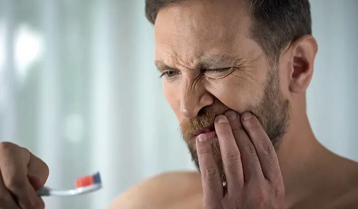 Man with bleeding gums